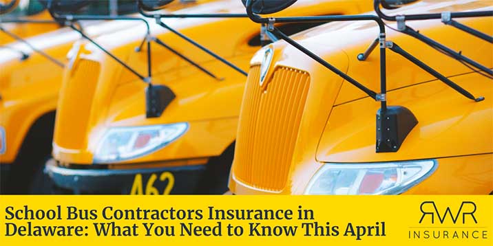 Yellow school buses lined up at an angle, with a focus on their front grills and mirrors - https://www.newjerseyschoolbusinsurance.com/